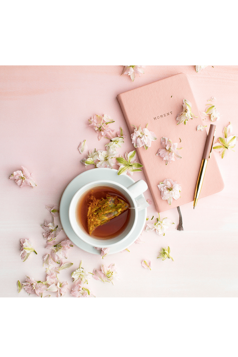 A warm cup of tea, journal, and pen – tools for mindful reflection when restarting healthy eating